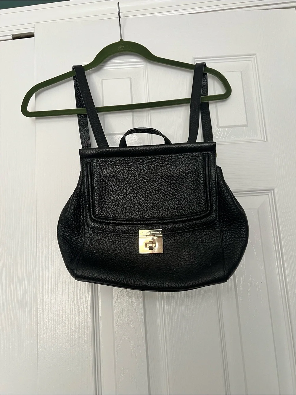kate spade Black Pebbled Leather Backpack with Gold-Tone Turn Lock